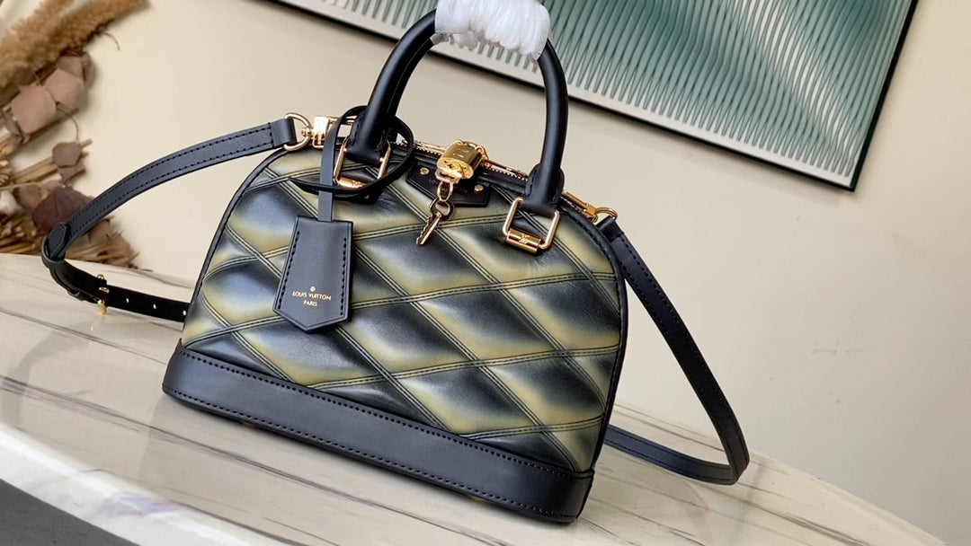 M23666 路L家-Nicolas Ghesquiere 貝殼包 黑色漸變