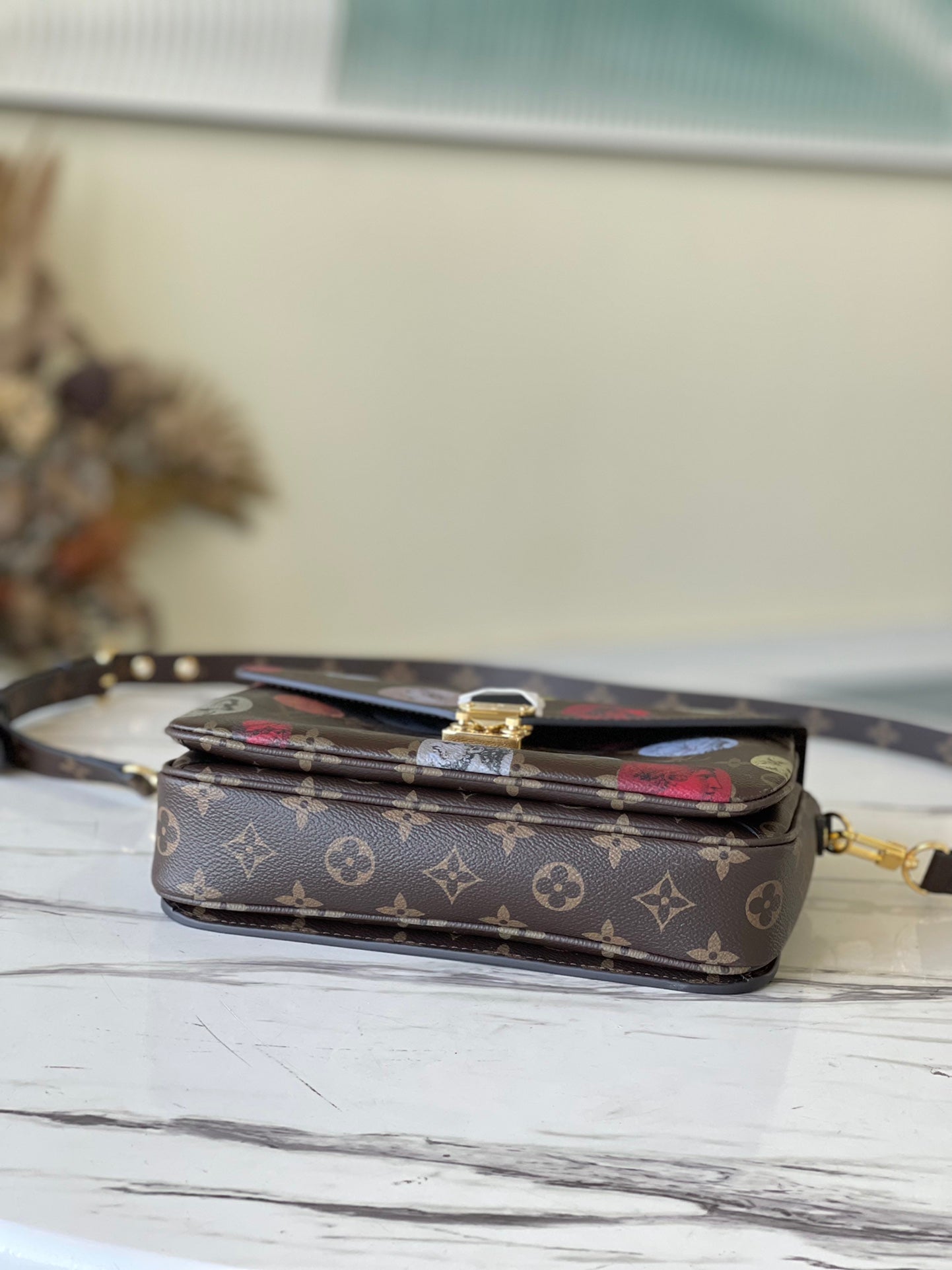 M59257 路L家-Pochette Métis 手袋