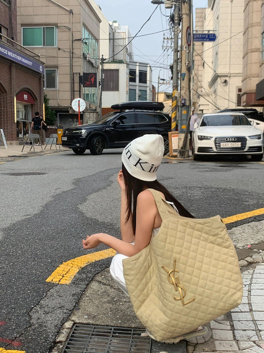 聖Y羅-ICARE托特包 小羊皮 奶白金扣 上身圖
