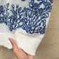 迪D家-2403 24早春新品重工蝴蝶花卉刺繡羊絨針織短袖上衣 白色