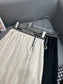 迪D家-2403 24SS夏季新款字母皮吊墜半身裙 黑色