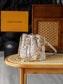 路L家-M26530 COUSSIN BUCKET手袋 小羊皮 杏色