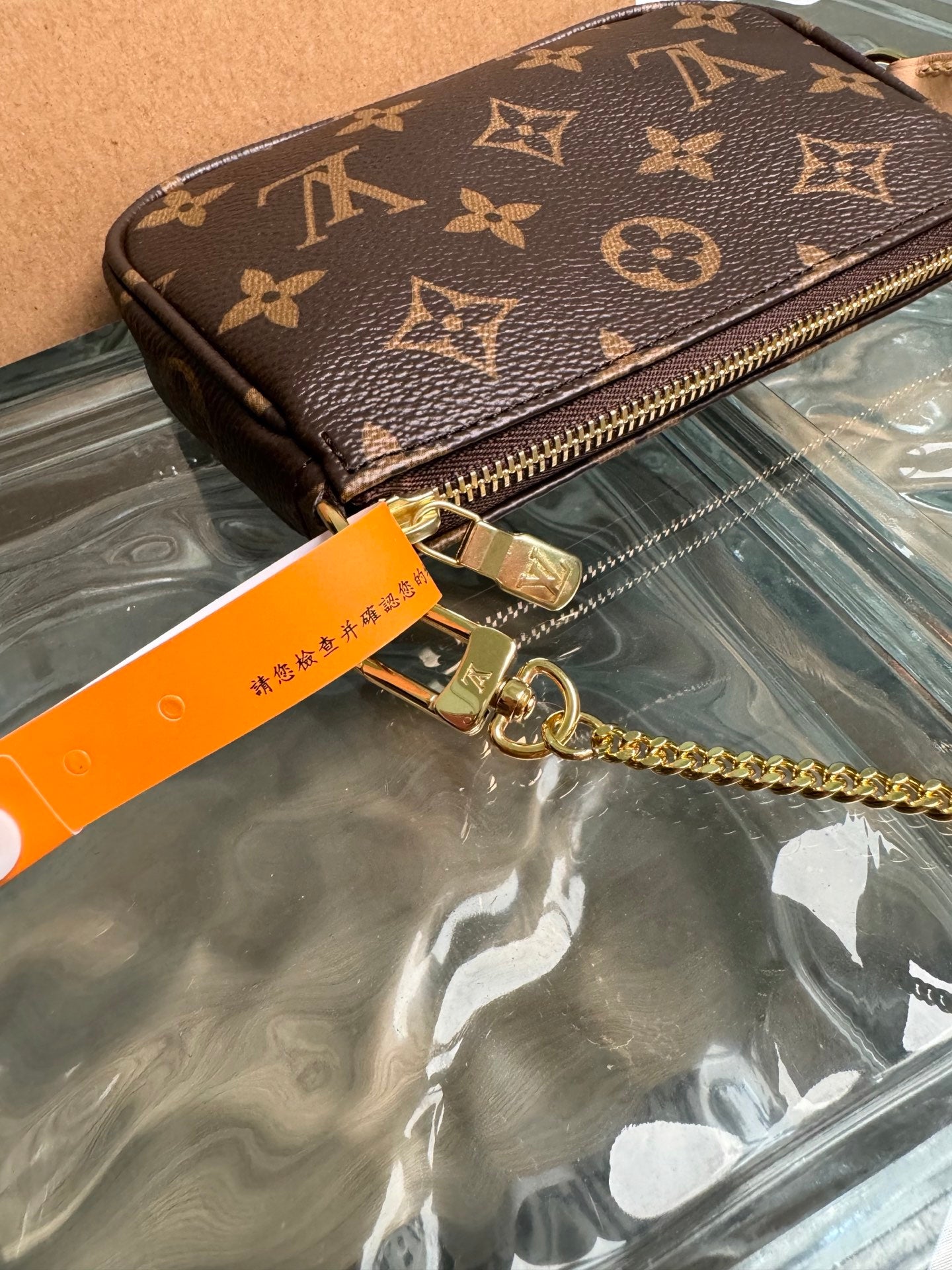 路L家- M58009 手拿包-經典老花