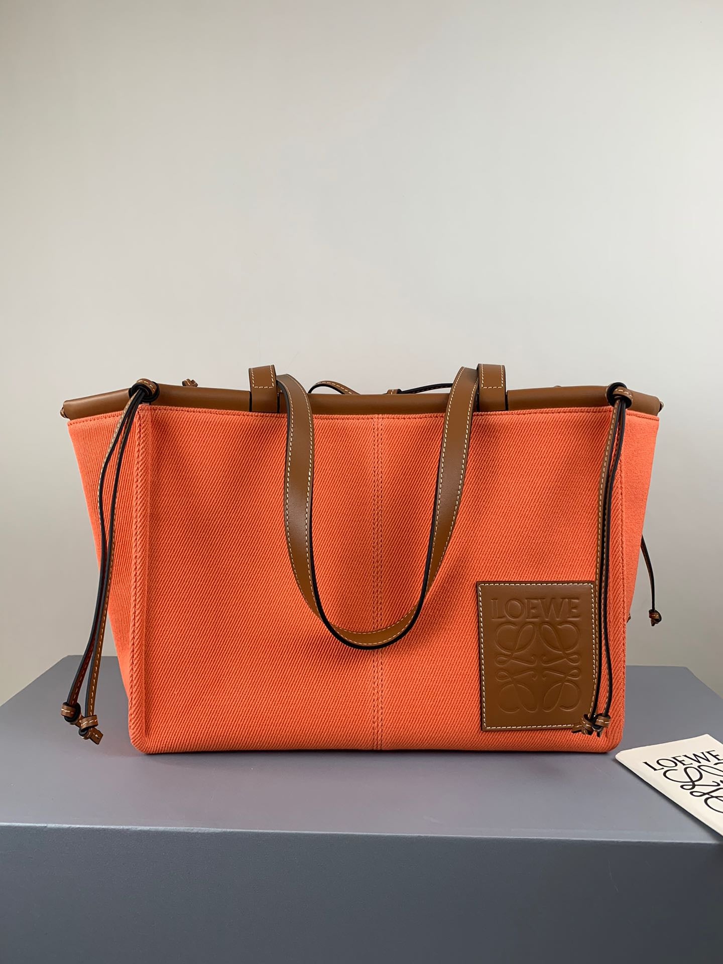 羅L威-Cushion tote 橘色棕皮