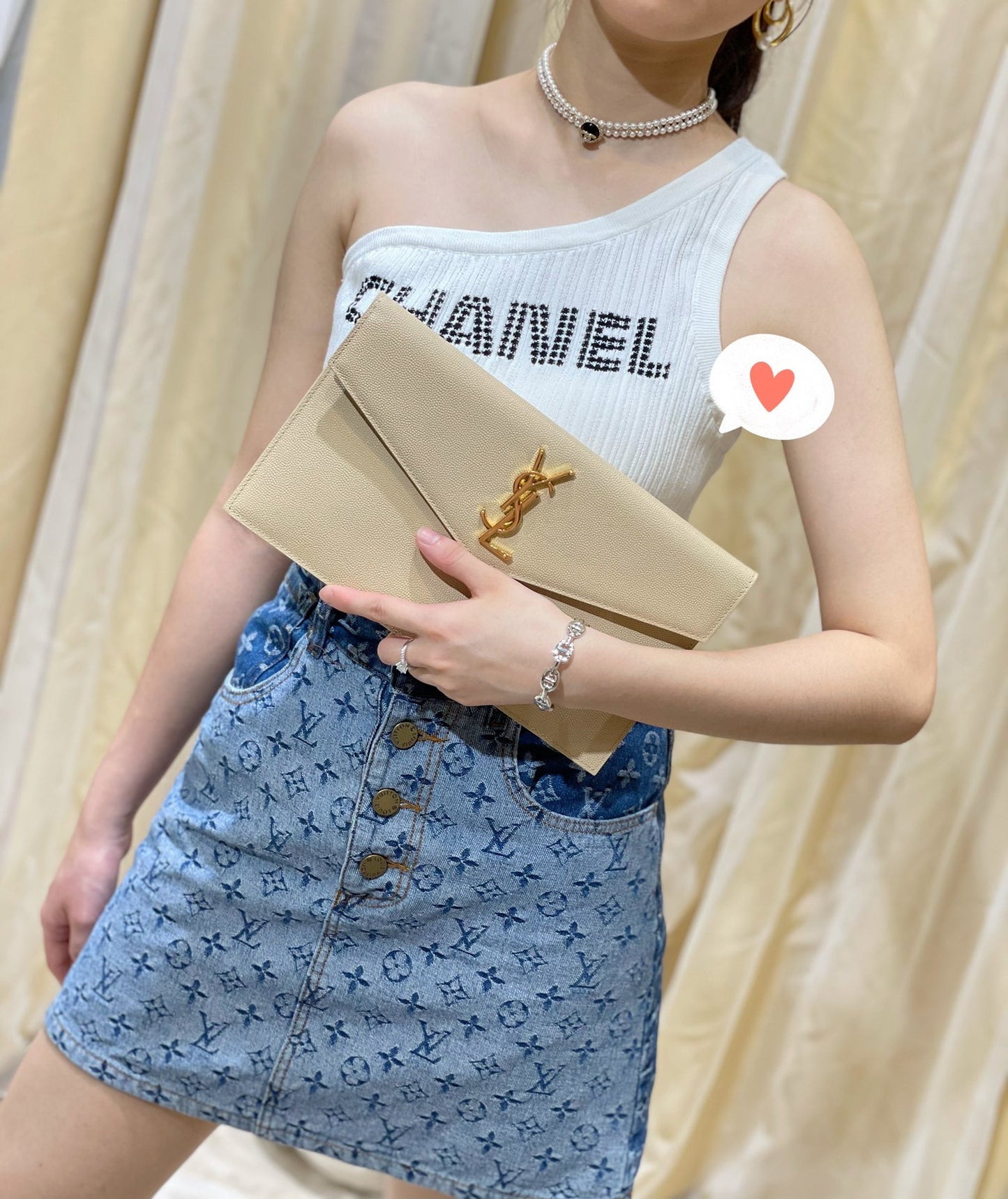 YSL ptown_新品手拿包-杏色魚子醬皮金釦