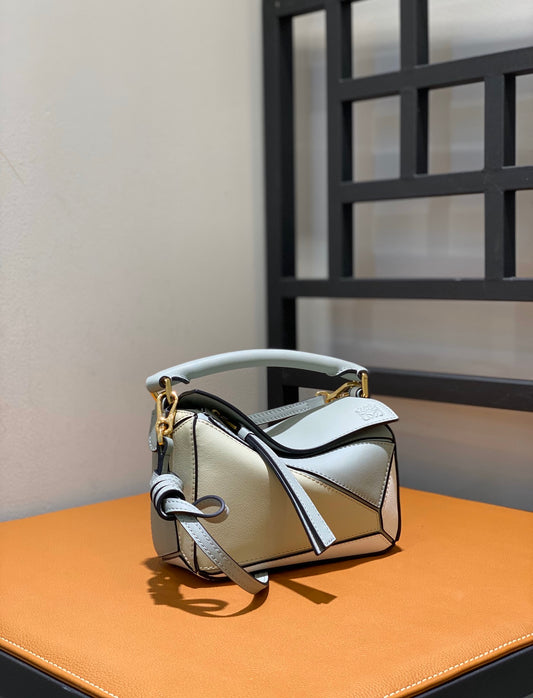 羅L威-Puzzle bag mini 小牛皮