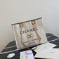 Chanel 中號米色條紋沙灘包