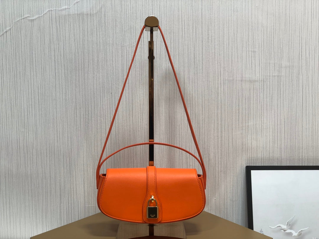 賽C家-Mini Tabou Clutch 鎖頭飾腋下包 橙色 平紋牛皮革