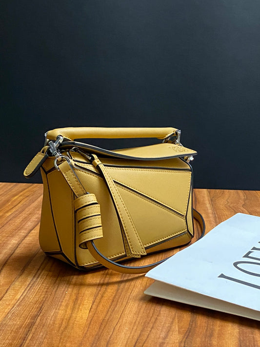 羅L威-Puzzle bag mini 小牛皮