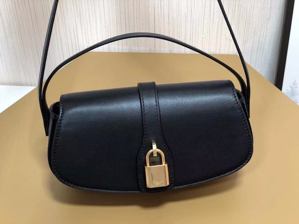 賽C家-Mini Tabou Clutch 鎖頭飾腋下包 黑色 平紋牛皮革