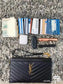 YSL Monogram 手拿包-黑山形紋金扣