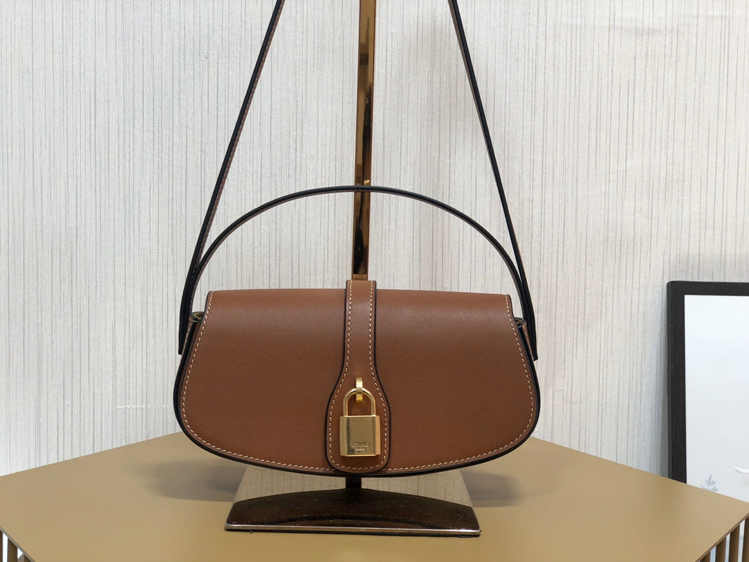 賽C家-Mini Tabou Clutch 鎖頭飾腋下包 棕色 平紋牛皮革