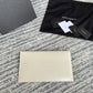 YSL ptown_新品手拿包-白牙籤紋金扣