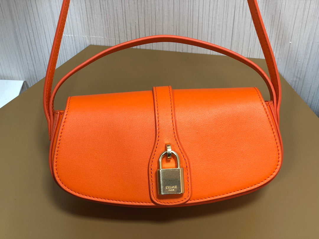 賽C家-Mini Tabou Clutch 鎖頭飾腋下包 橙色 平紋牛皮革