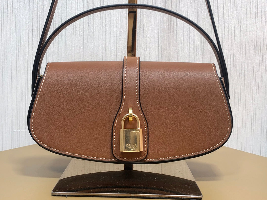 賽C家-Mini Tabou Clutch 鎖頭飾腋下包 棕色 平紋牛皮革