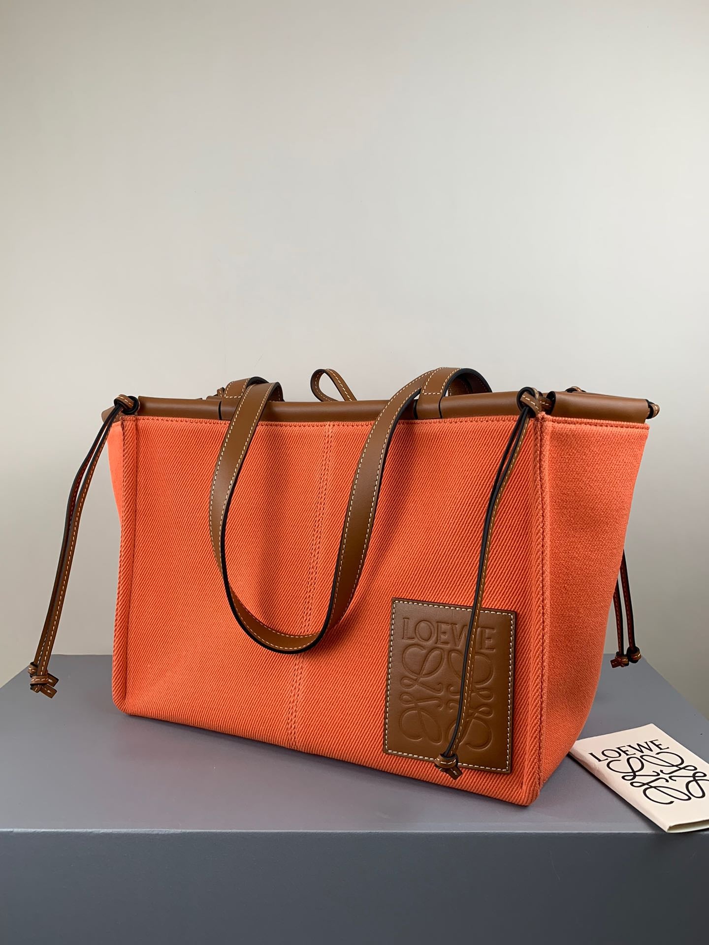 羅L威-Cushion tote 橘色棕皮