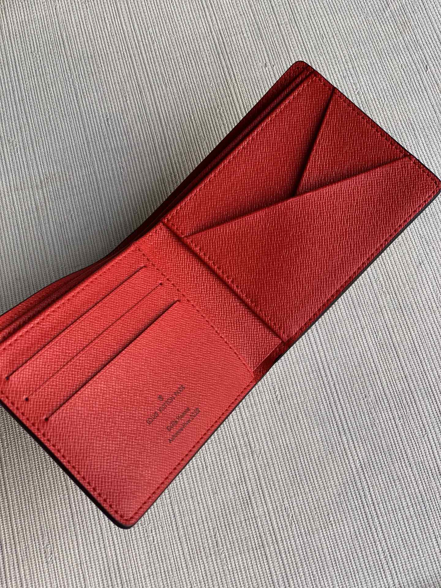 LV M69699 雙面短夾