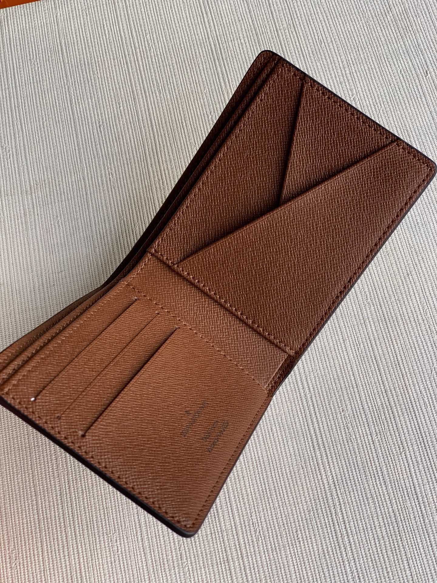 LV M69699 雙面短夾