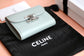 Celine TRIOMPHE 小號亮澤羊皮翻蓋錢包-礦石灰