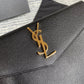 YSL ptown_新品手拿包-黑色魚子醬皮金釦