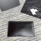 YSL ptown_新品手拿包-黑色牙籤紋金扣