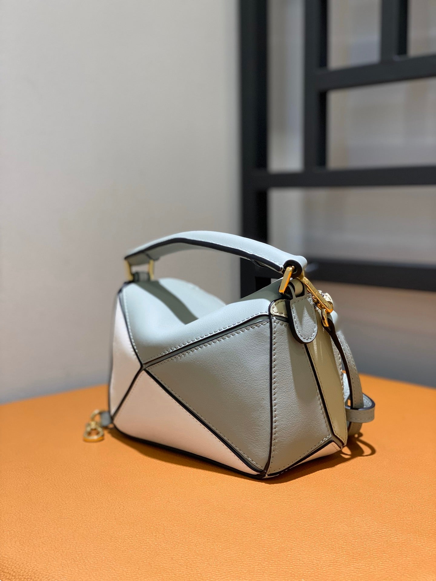 羅L威-Puzzle bag mini 小牛皮