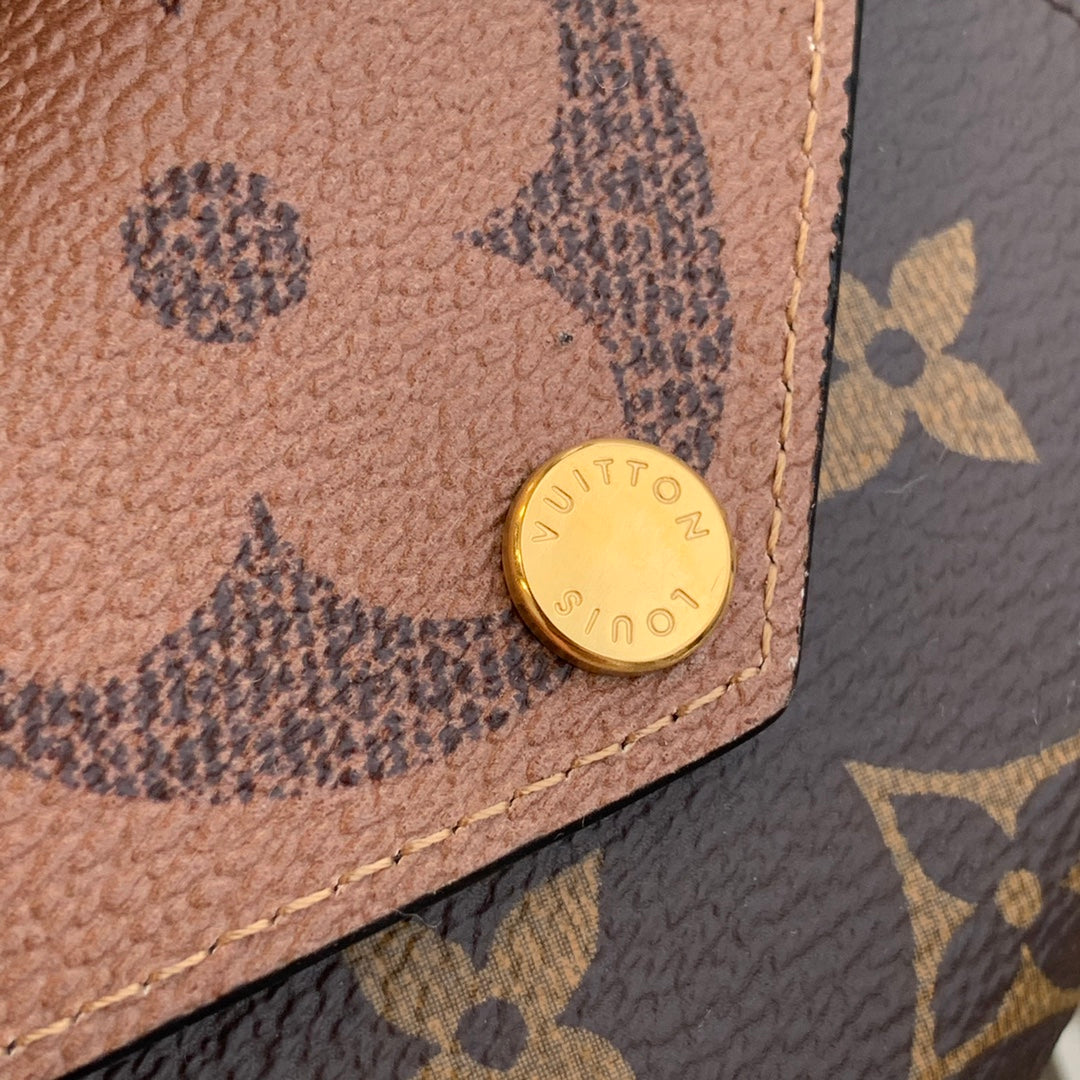 LV M80725 黃花 Zoe 三折短夾