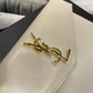 YSL ptown_新品手拿包-白光滑皮金釦