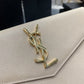 YSL ptown_新品手拿包-杏色魚子醬皮金釦