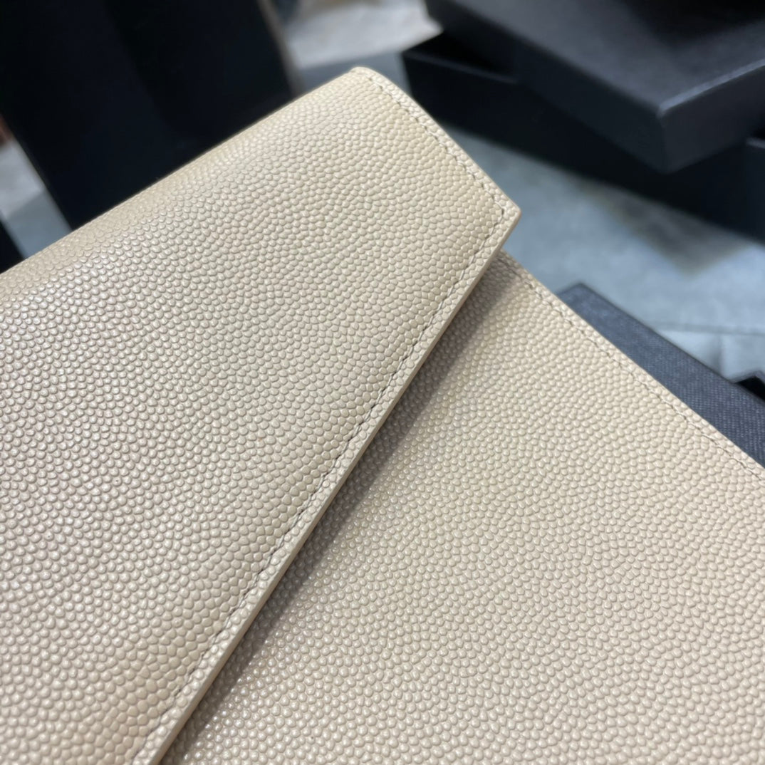 YSL ptown_新品手拿包-杏色魚子醬皮金釦