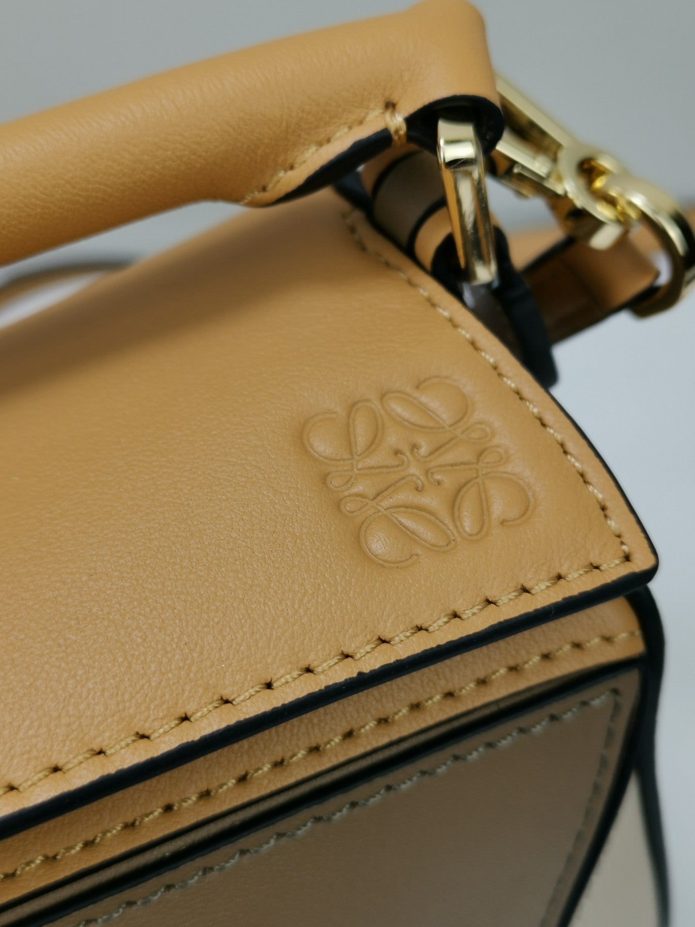羅L威-Puzzle bag mini 小牛皮