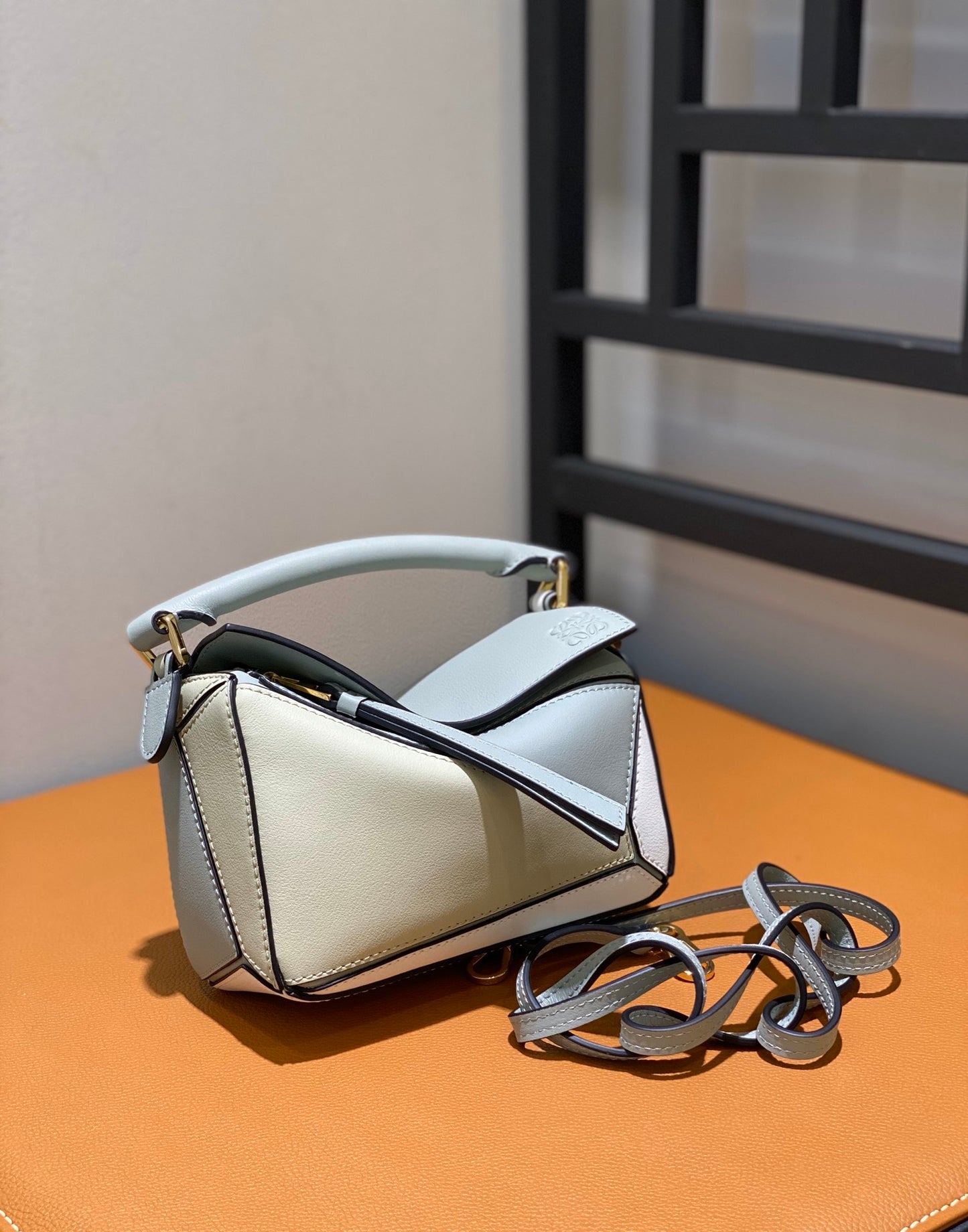 羅L威-Puzzle bag mini 小牛皮