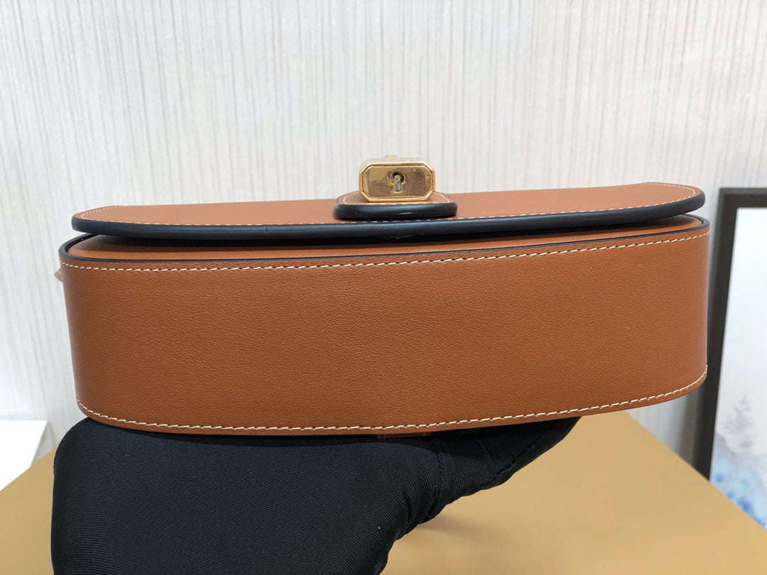 賽C家-Mini Tabou Clutch 鎖頭飾腋下包 棕色 平紋牛皮革
