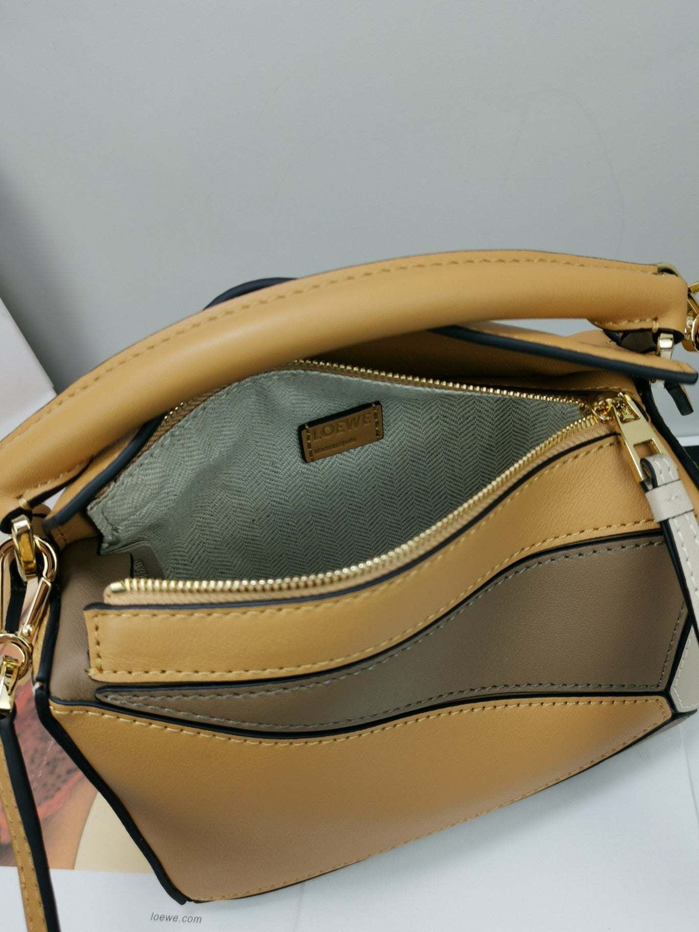 羅L威-Puzzle bag mini 小牛皮